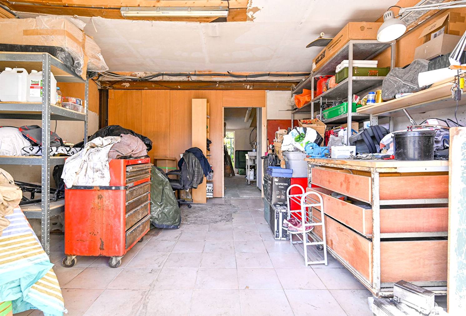 Maison avec garage à vendre par agence immobilière